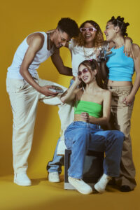 portrait-young-friends-2000s-fashion-style-posing-with-portable-audio-player-camera